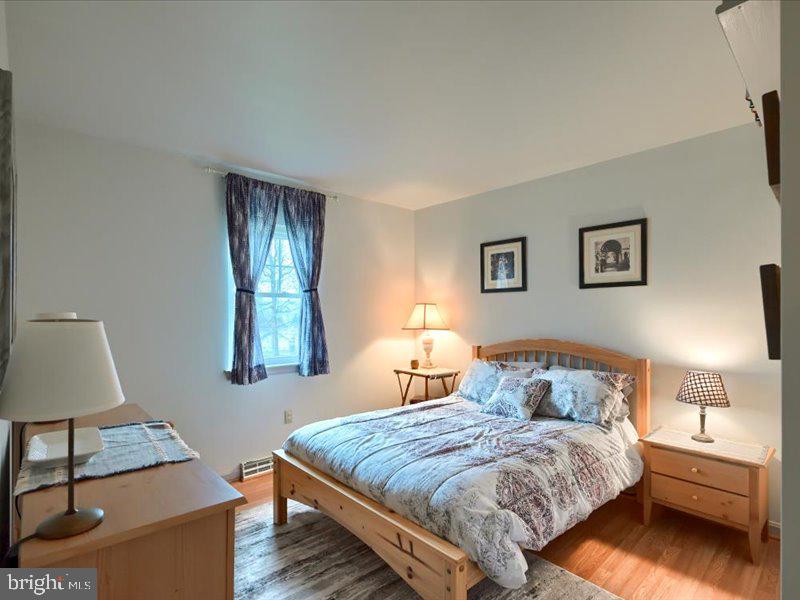 301 Larkin Drive Red Lion, PA 17356 - Photo 45 of 61 a bedroom with a bed and a lamp