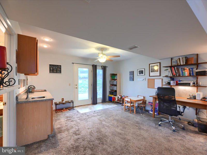 301 Larkin Drive Red Lion, PA 17356 - Photo 52 of 61 a view of a livingroom with workspace and a window