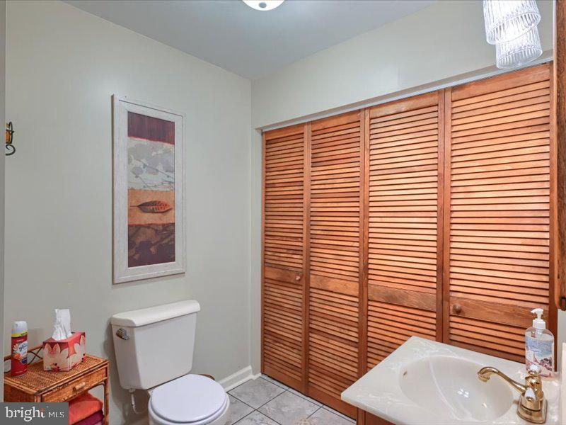 301 Larkin Drive Red Lion, PA 17356 - Photo 53 of 61 a bathroom with a sink a toilet and mirror in it