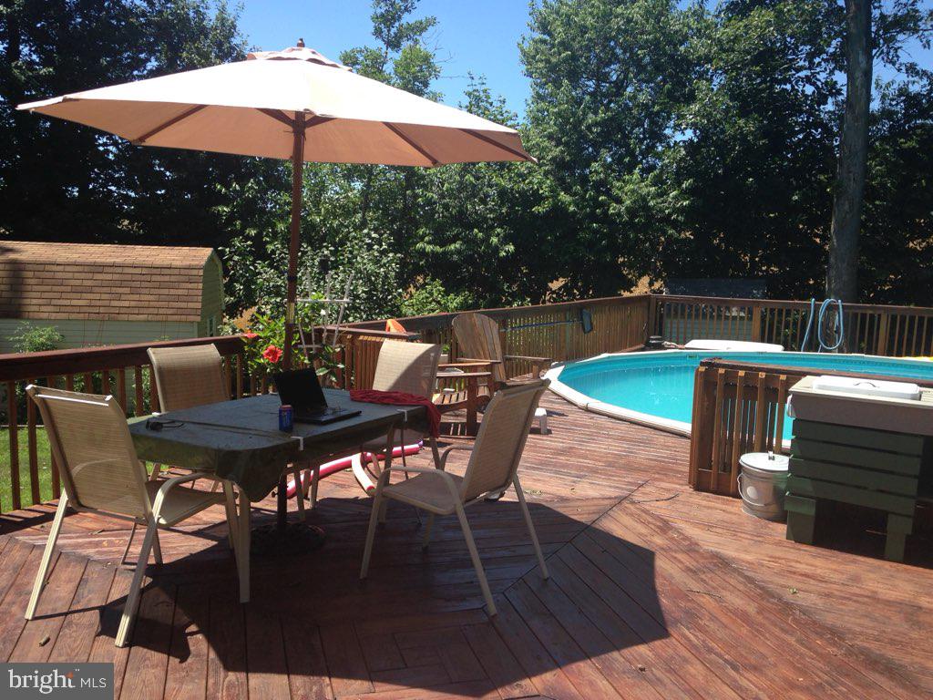 301 Larkin Drive Red Lion, PA 17356 - Photo 10 of 61 a view of backyard with seating space and trees