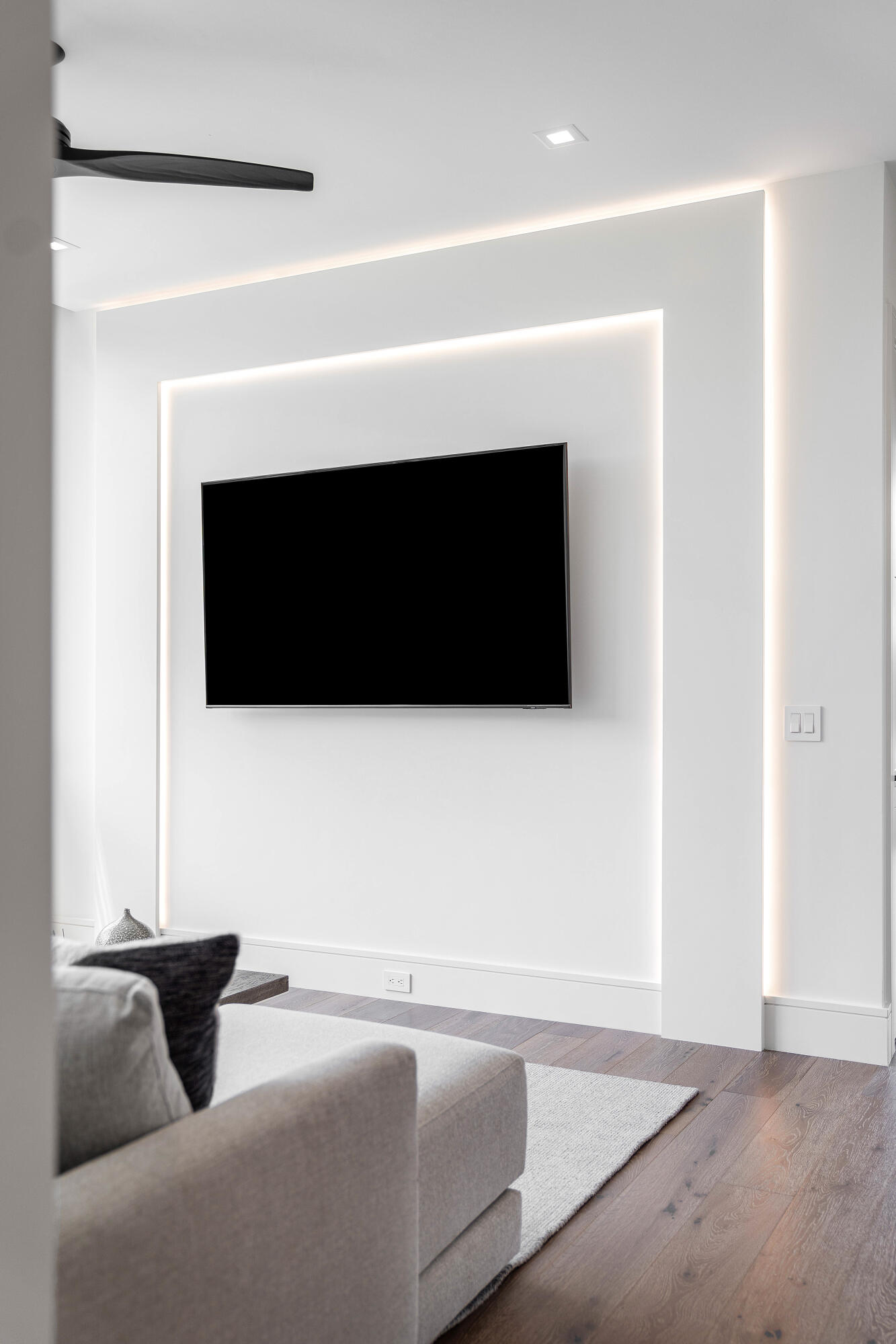 320 Northeast Wavecrest Way Boca Raton, FL 33432 - Photo 36 of 65 a living room with a fireplace and a flat screen tv