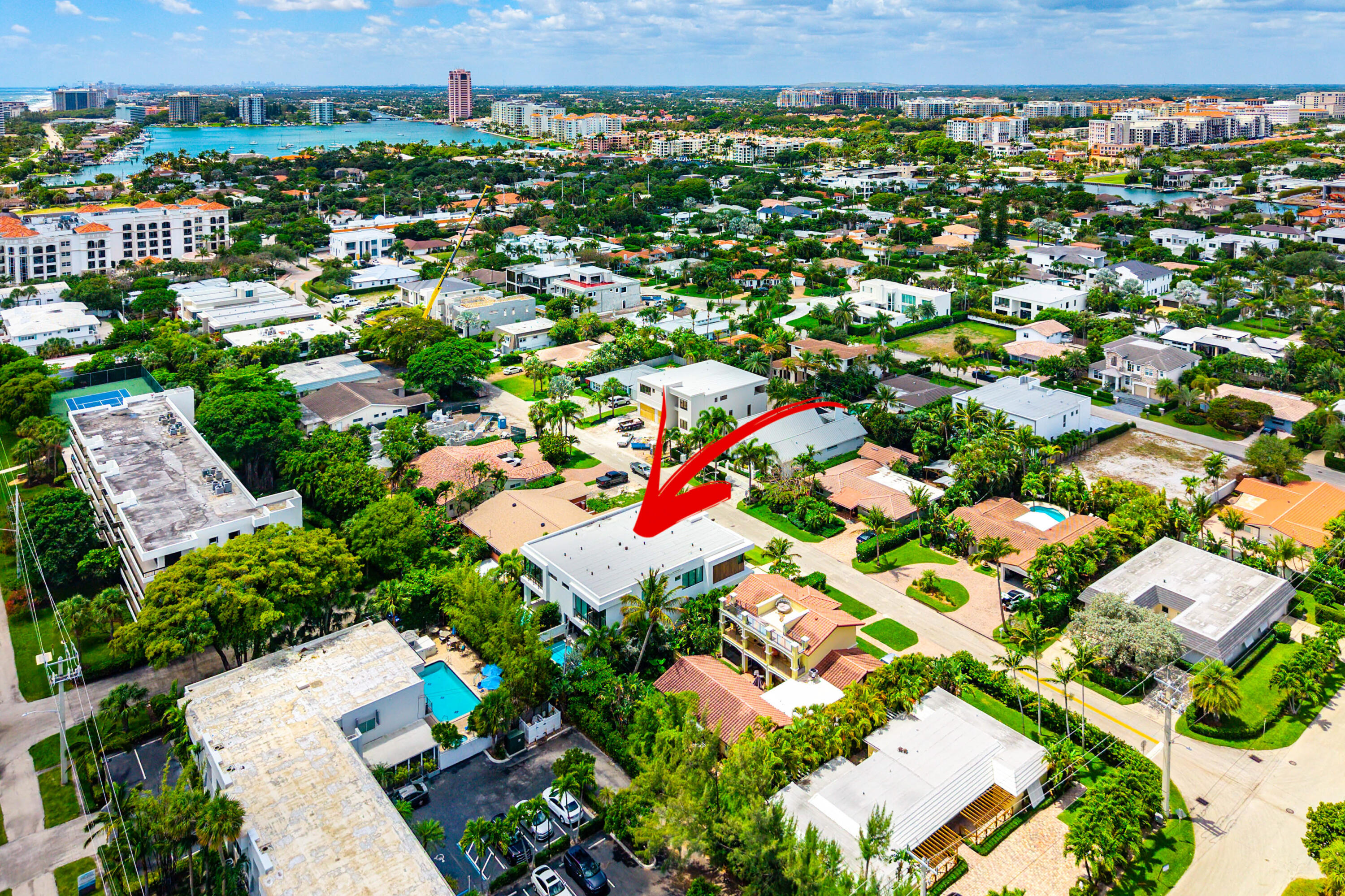 320 Northeast Wavecrest Way Boca Raton, FL 33432 - Photo 57 of 65 an aerial view of residential houses with outdoor space and trees