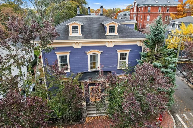 a view of a house with a garden