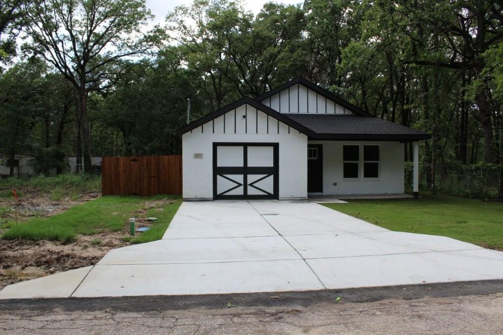 125 Chapperall Drive Mabank, TX 75156 - Photo 1 of 11 front view of a house with a yard
