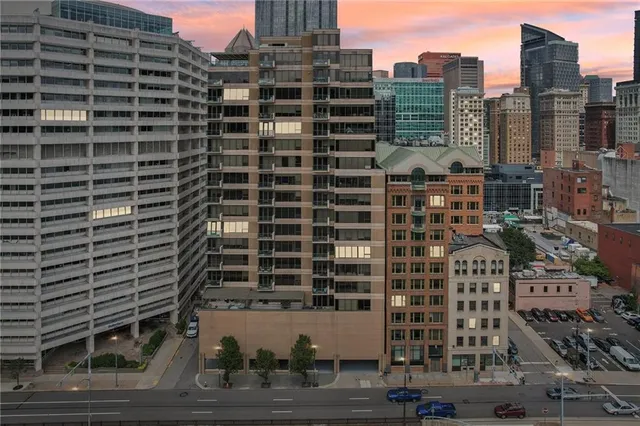 a view of a city with tall buildings