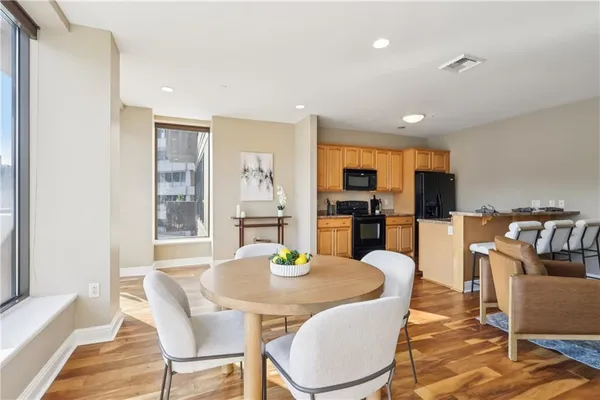 a living room with furniture and a table