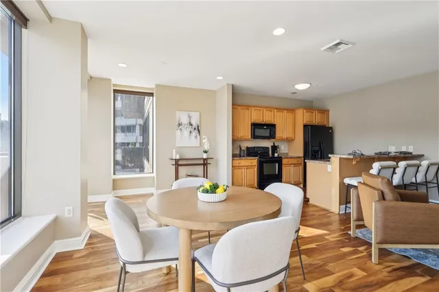 a living room with furniture and a rug