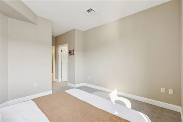a bathroom with a tub sink and a mirror