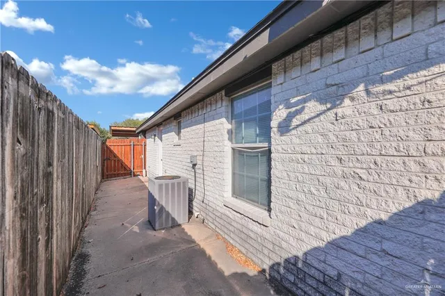 a view of a house with a wooden stairs