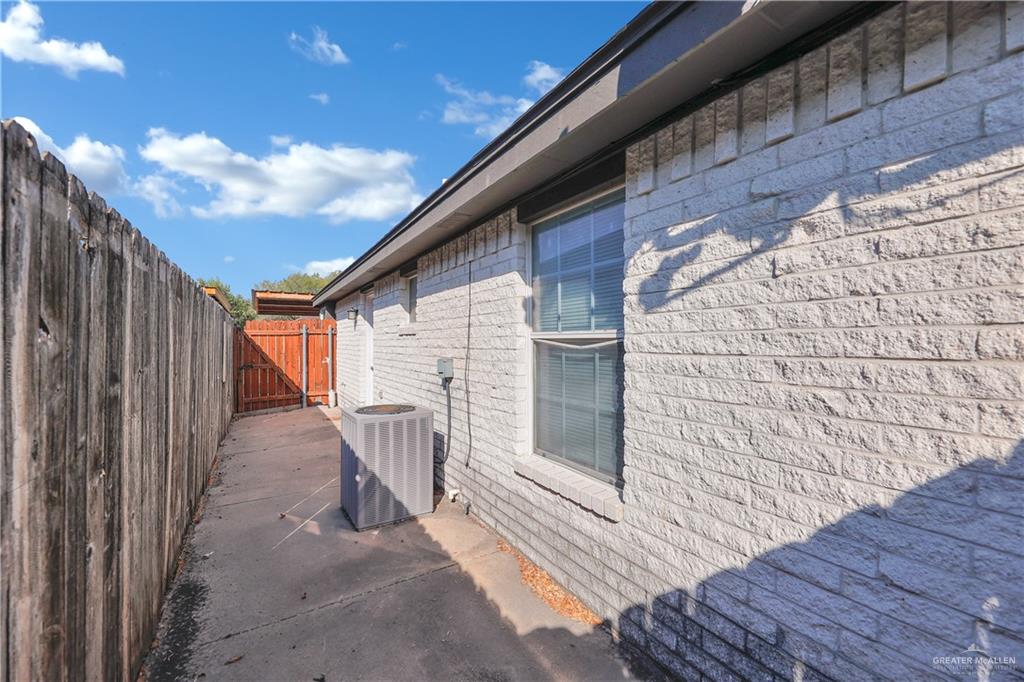 2213 North Dahlia Street, Unit 2 Pharr, TX 78577 - Photo 16 of 18 a view of a house with a wooden stairs