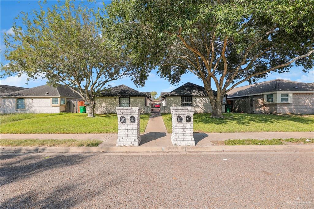 2213 North Dahlia Street, Unit 2 Pharr, TX 78577 - Photo 2 of 18 a view of house with outdoor space and tree s