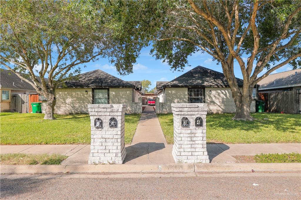 2213 North Dahlia Street, Unit 2 Pharr, TX 78577 - Photo 3 of 18 a view of a yard with plants