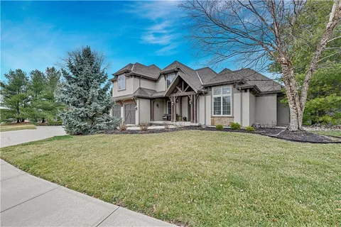$865,000 | 1700 Northeast Woodland Shores Lane, Lee's Summit, MO 64086