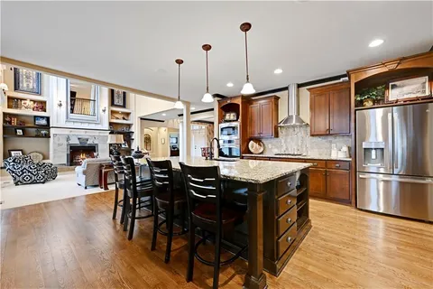 $865,000 | 1700 Northeast Woodland Shores Lane, Lee's Summit, MO 64086