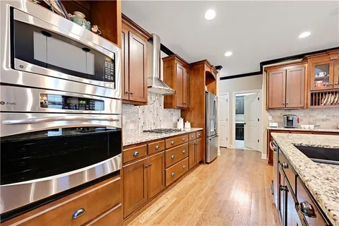 $865,000 | 1700 Northeast Woodland Shores Lane, Lee's Summit, MO 64086