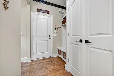 $865,000 | 1700 Northeast Woodland Shores Lane, Lee's Summit, MO 64086