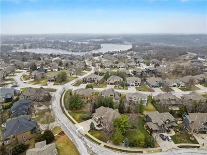 $865,000 | 1700 Northeast Woodland Shores Lane, Lee's Summit, MO 64086