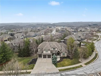 $865,000 | 1700 Northeast Woodland Shores Lane, Lee's Summit, MO 64086