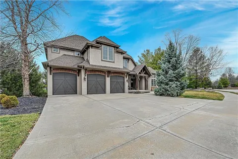 $865,000 | 1700 Northeast Woodland Shores Lane, Lee's Summit, MO 64086