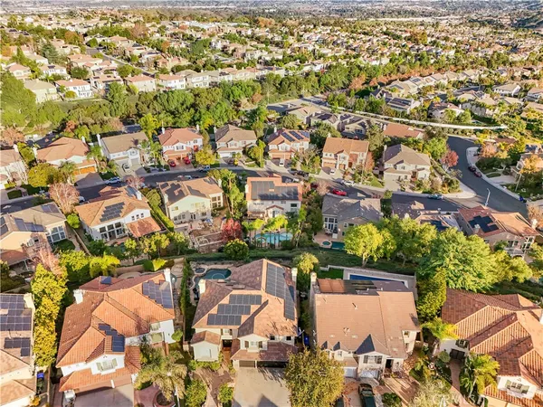 an aerial view of a city with lots of residential buildings