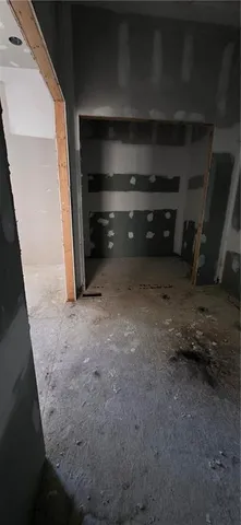 en empty room with windows