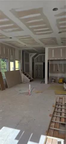 a view of a living room with entryway