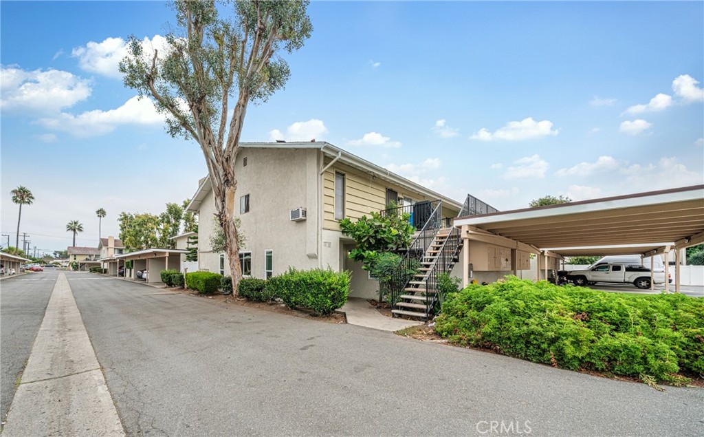 1192 Mitchell Avenue, Unit 70 Tustin, CA 92780 - Photo 21 of 29 a house view with a outdoor space