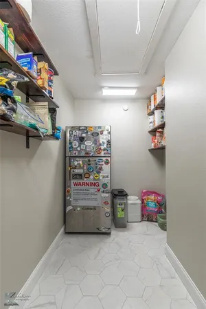 a view of storage and utility room