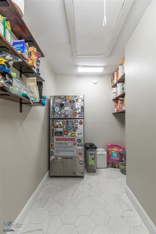 917 County Road 3798 Springtown, TX 76082 - Photo 14 of 40 a view of storage and utility room