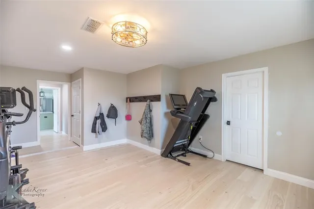 a view of a room with gym equipment