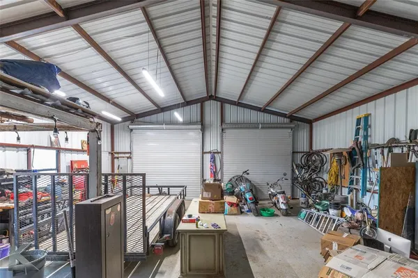 a view of swimming pool with a yard