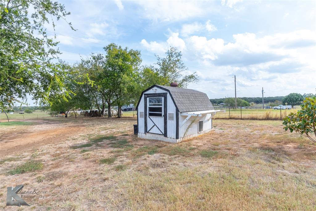 917 County Road 3798 Springtown, TX 76082 - Photo 34 of 40 a view of swimming pool with a yard