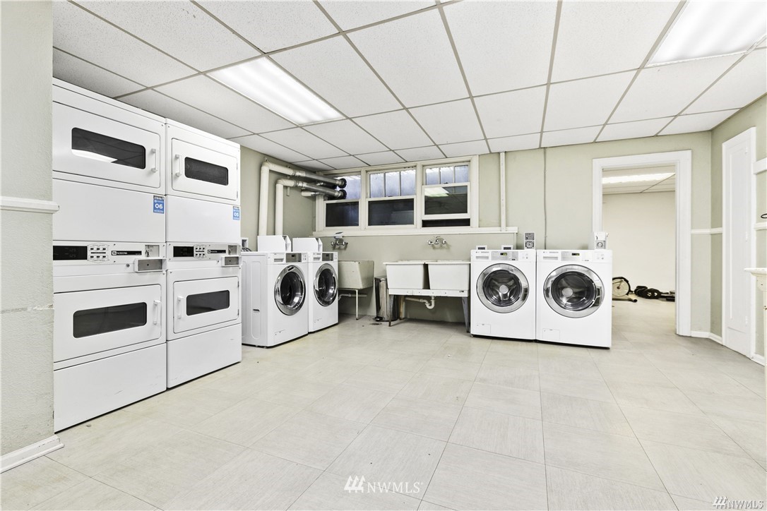 519 West Roy Street, Unit 408 Seattle, WA 98119 - Photo 15 of 25 a utility room with dryer and washer
