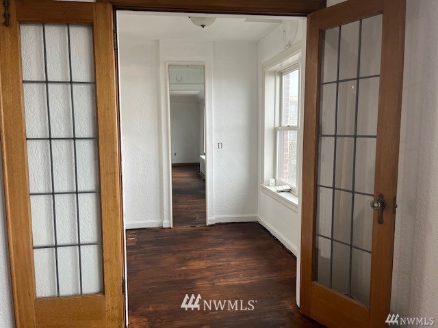 519 West Roy Street, Unit 408 Seattle, WA 98119 - Photo 9 of 25 a view of entryway with wooden floor