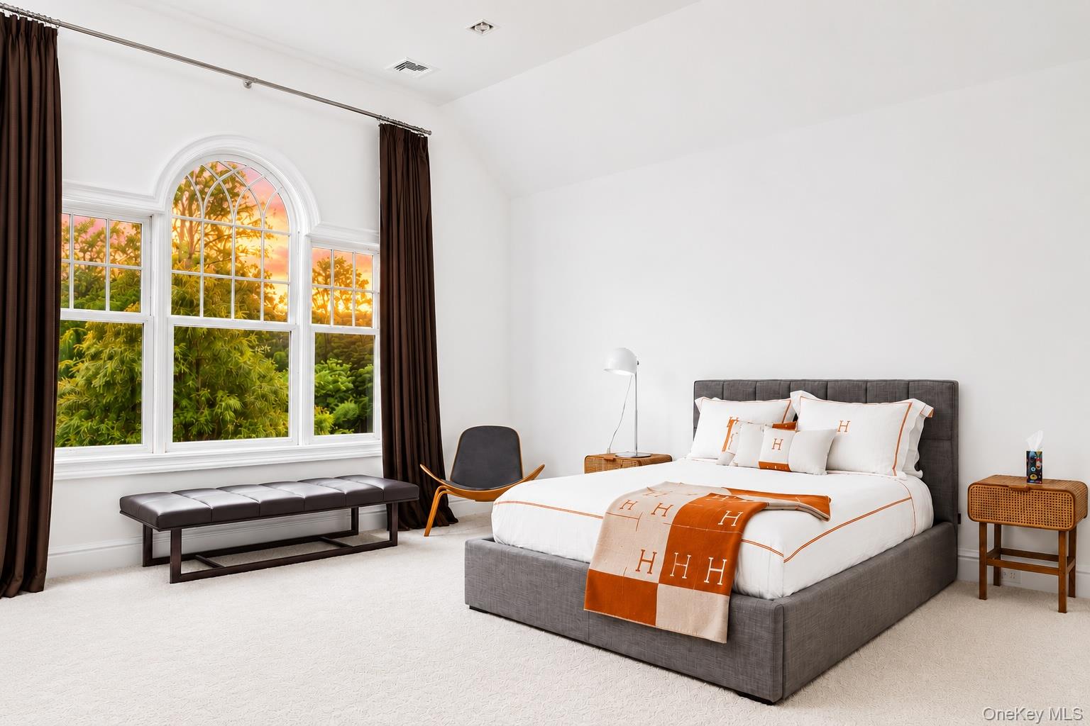 486 Middle Line Highway Bridgehampton, NY 11976 - Photo 21 of 28 a spacious bedroom with a bed and a large window