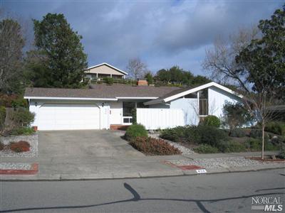 494 Las Colindas Road San Rafael, CA 94903 - Photo 1 of 8 a view of a house with a yard