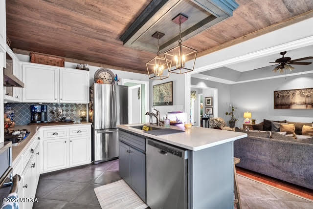 116 Newport Road Northeast Milledgeville, GA 31061 - Photo 15 of 30 a kitchen that has a lot of cabinets in it