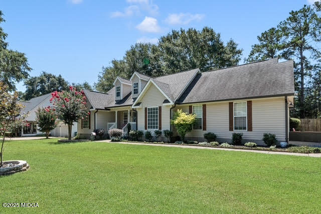 116 Newport Road Northeast Milledgeville, GA 31061 - Photo 2 of 30 a front view of house with yard and green space