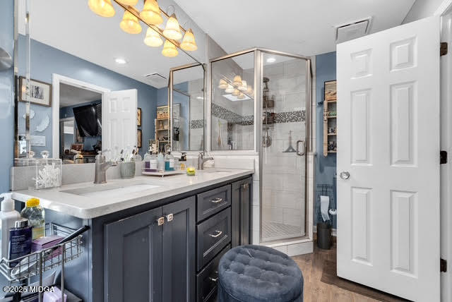 116 Newport Road Northeast Milledgeville, GA 31061 - Photo 23 of 30 a bathroom with a granite countertop sink a mirror and shower