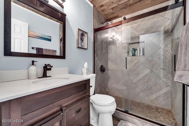 116 Newport Road Northeast Milledgeville, GA 31061 - Photo 26 of 30 a bathroom with a sink vanity mirror and toilet