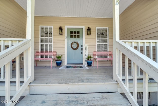 116 Newport Road Northeast Milledgeville, GA 31061 - Photo 4 of 30 a view of front door of house with stairs
