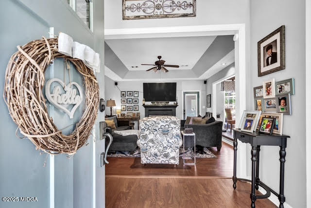 116 Newport Road Northeast Milledgeville, GA 31061 - Photo 5 of 30 a living room with furniture a flat screen tv and a fireplace