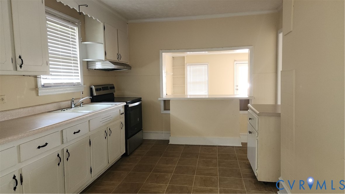 24816 Sawmill Road Carson, VA 23830 - Photo 14 of 24 Kitchen featuring white cabinetry, a double basin