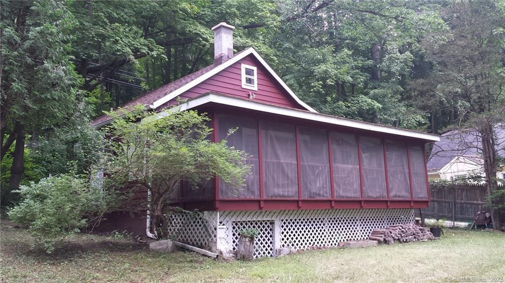 381 Kent Road New Milford, CT 06776 - Photo 1 of 1 a front view of a house with a yard