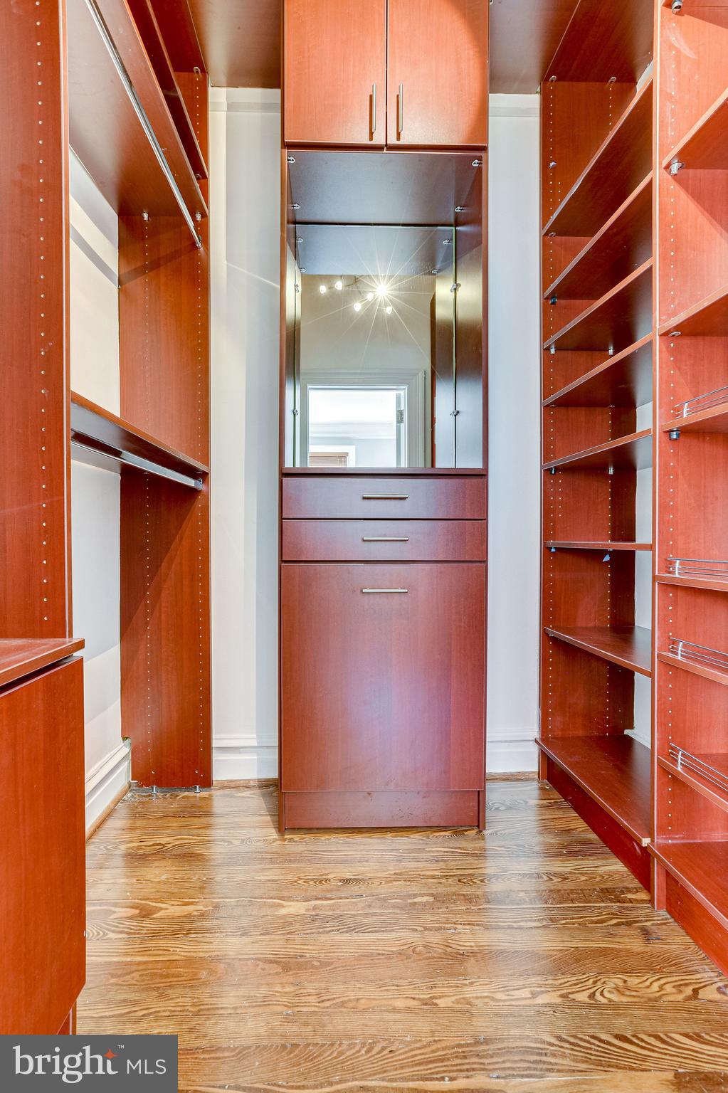 1514 17th Street Northwest, Unit 107 Washington, DC 20036 - Photo 23 of 63 Large custom walk-in closet system (Primary BR)