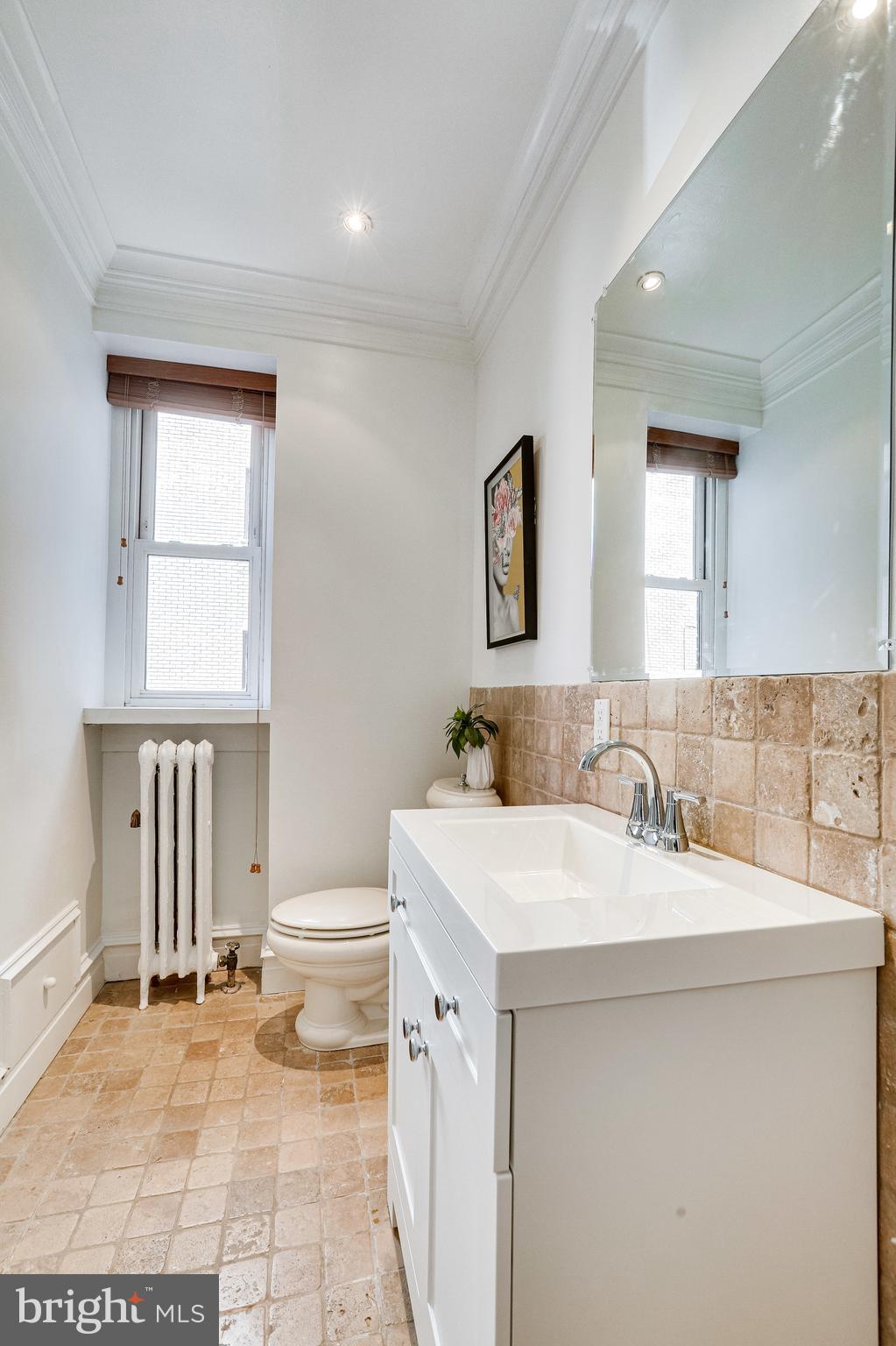 1514 17th Street Northwest, Unit 107 Washington, DC 20036 - Photo 25 of 63 Bathroom connects to primary BR as well as foyer