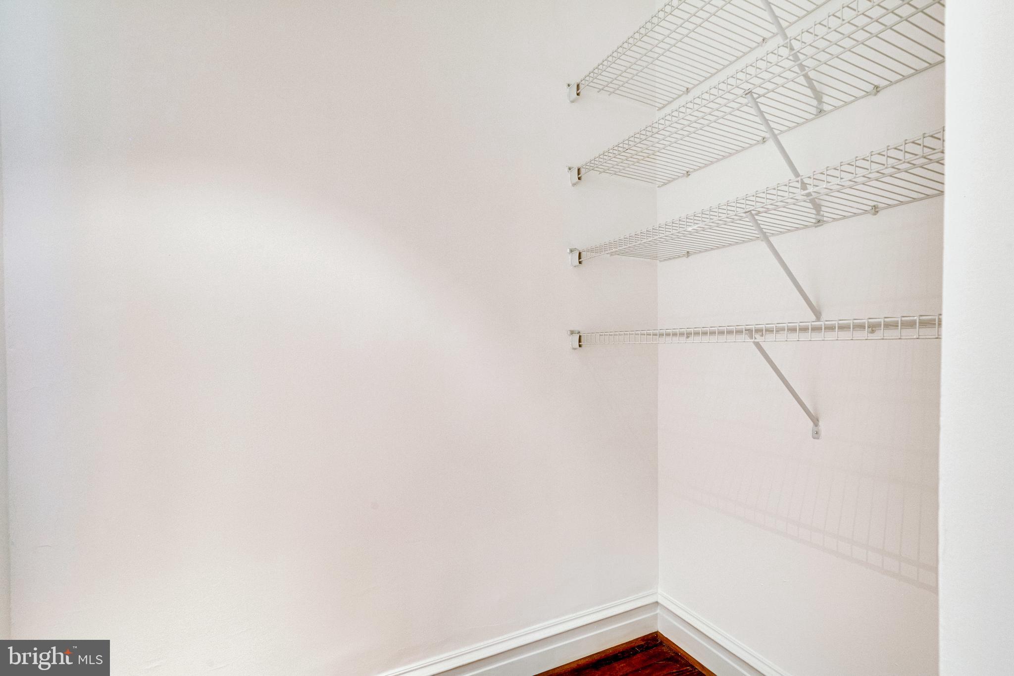 1514 17th Street Northwest, Unit 107 Washington, DC 20036 - Photo 34 of 63 A third large walk-in closet is adjacent to the ba