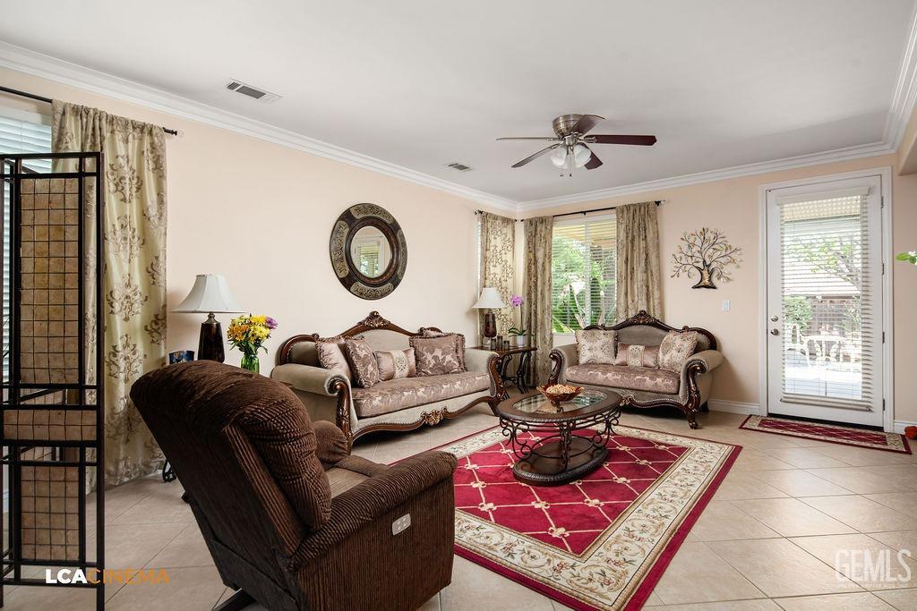 Undisclosed Address Bakersfield, CA 93306 - Photo 12 of 51 a living room with furniture a rug and a large window