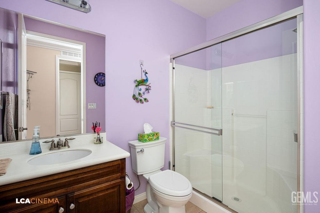 Undisclosed Address Bakersfield, CA 93306 - Photo 19 of 51 a bathroom with a sink toilet and shower