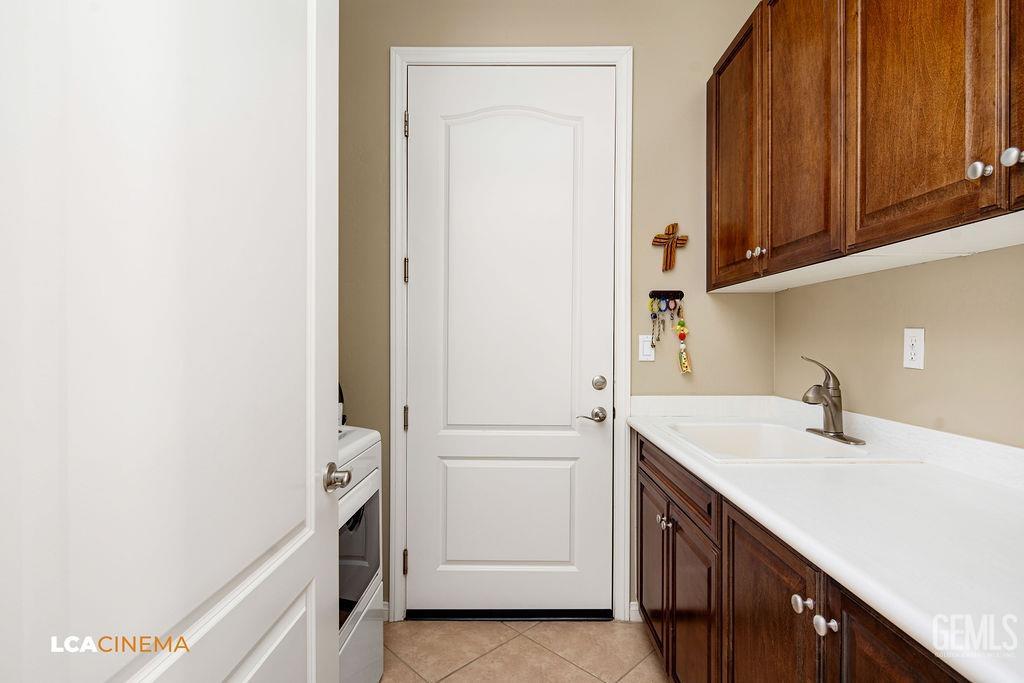 Undisclosed Address Bakersfield, CA 93306 - Photo 20 of 51 a bathroom with a sink and a mirror